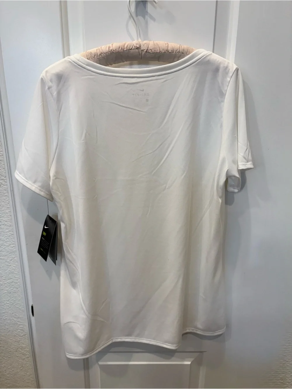 Nike Women’s White Short Sleeve Dri-FIT Tee with Black Swoosh - Picture 4 of 6